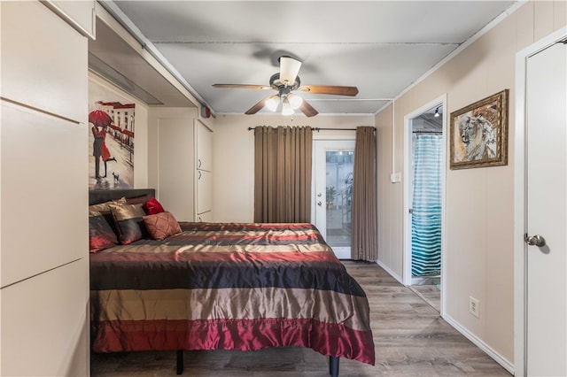 bedroom with ornamental molding, hardwood / wood-style floors, and ceiling fan