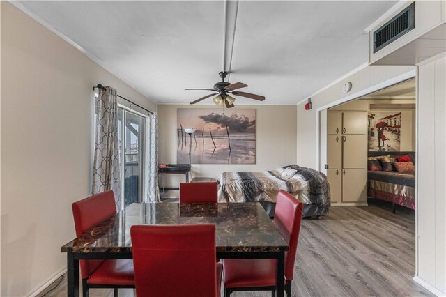 14300 S Padre Island Dr Unit 207, Corpus Christi, TX 78418 - dining area featuring ceiling fan and wood finished floors
