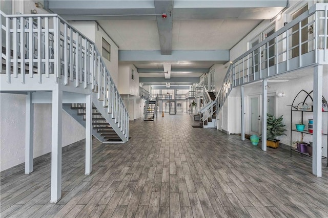 14300 S Padre Island Dr Unit 207, Corpus Christi, TX 78418 - exercise room with wood finished floors and beam ceiling