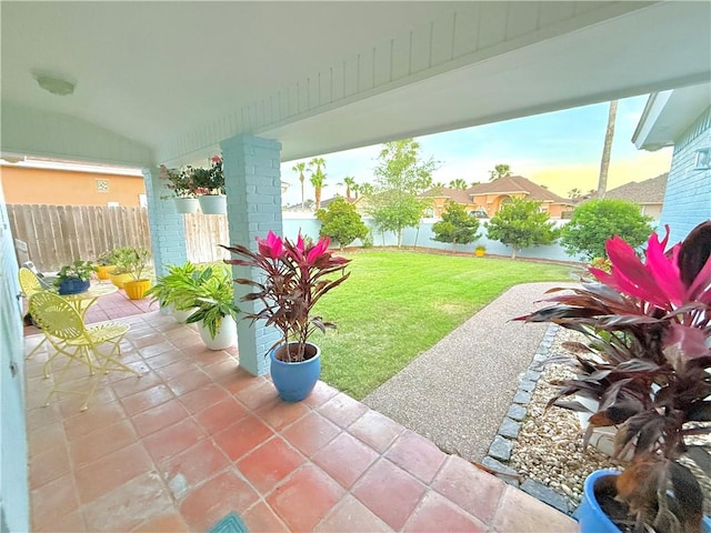 view of patio / terrace featuring fence