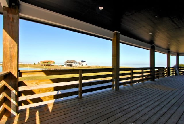 deck featuring a water view