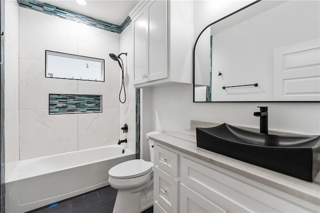 full bathroom featuring shower / bathing tub combination, toilet, and vanity
