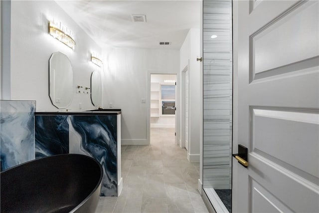10 Westpointe Dr, Rockport, TX 78382 - bathroom with baseboards and a soaking tub