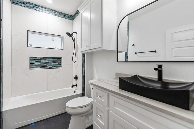 10 Westpointe Dr, Rockport, TX 78382 - bathroom with toilet, vanity, bathing tub / shower combination, and tile patterned floors