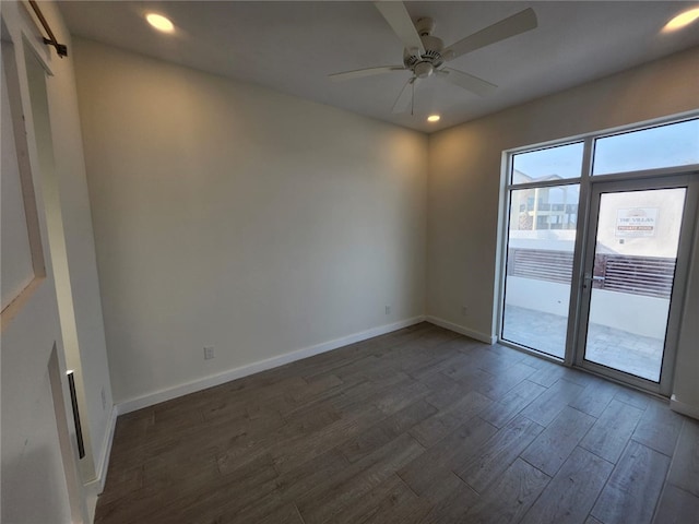 empty room featuring baseboards, recessed lighting, a ceiling fan, and dark wood-style flooring