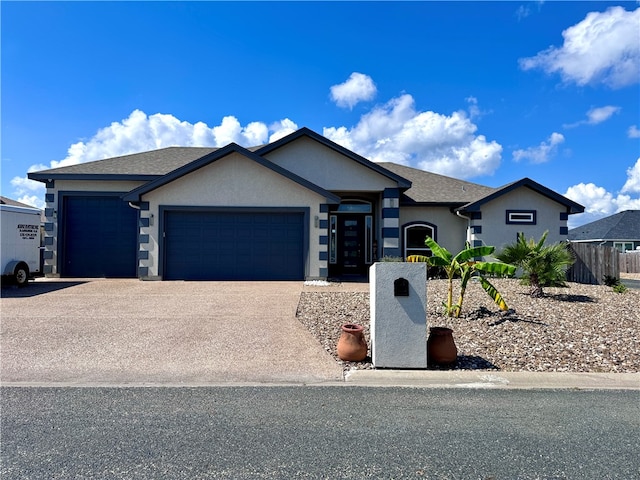 ranch-style house with a garage