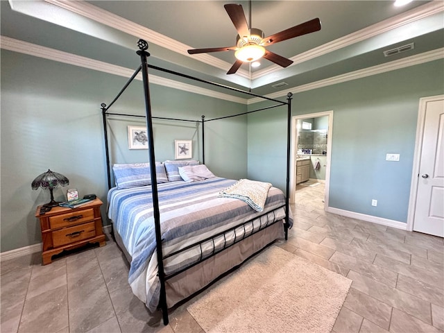 bedroom featuring ceiling fan, connected bathroom, a raised ceiling, and ornamental molding