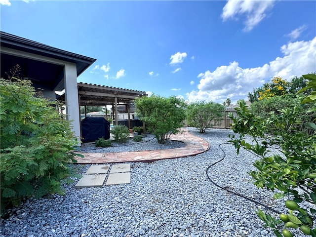 view of yard featuring a pergola and a patio area