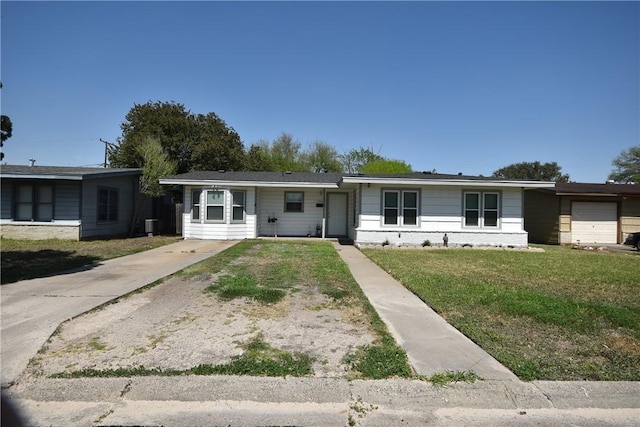 ranch-style home with a front lawn