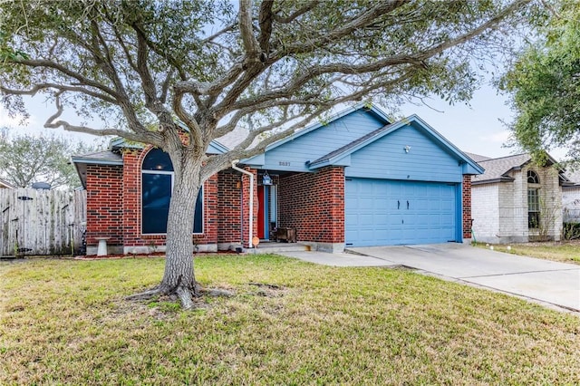 ranch-style house featuring a garage and a front lawn