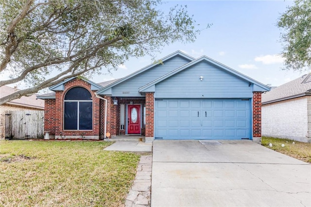 ranch-style house with a front yard and a garage