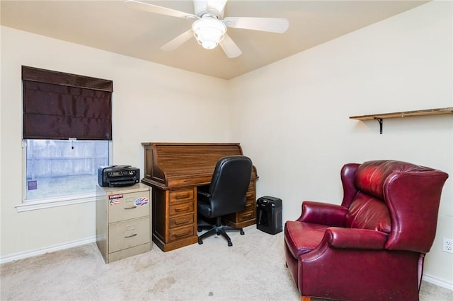 carpeted office with ceiling fan