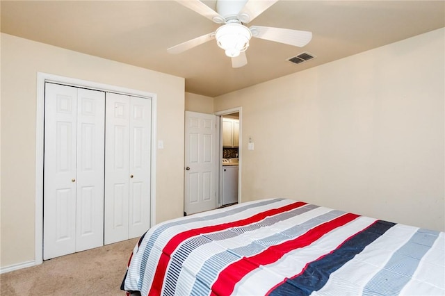 carpeted bedroom featuring a closet and ceiling fan