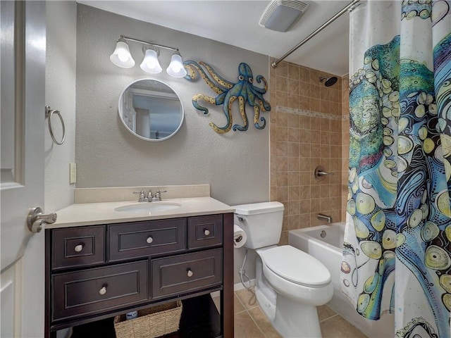 200 W Cotter Ave Unit C3, Port Aransas, TX 78373 - full bathroom with tile patterned flooring, toilet, vanity, shower / bath combo with shower curtain, and a textured wall