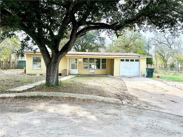 single story home with a garage