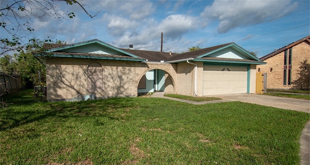 single story home with a front lawn and a garage