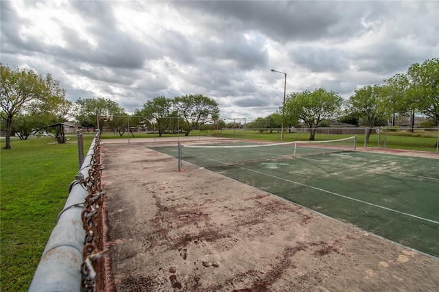 view of property's community with a yard