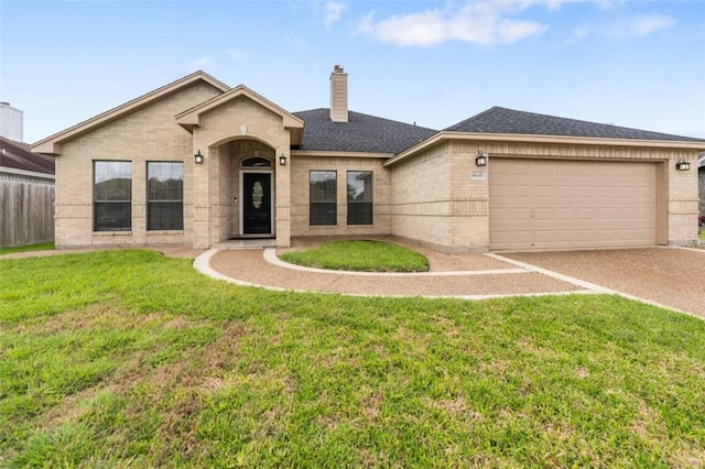 single story home with a chimney, a front yard, brick siding, concrete driveway, and an attached garage