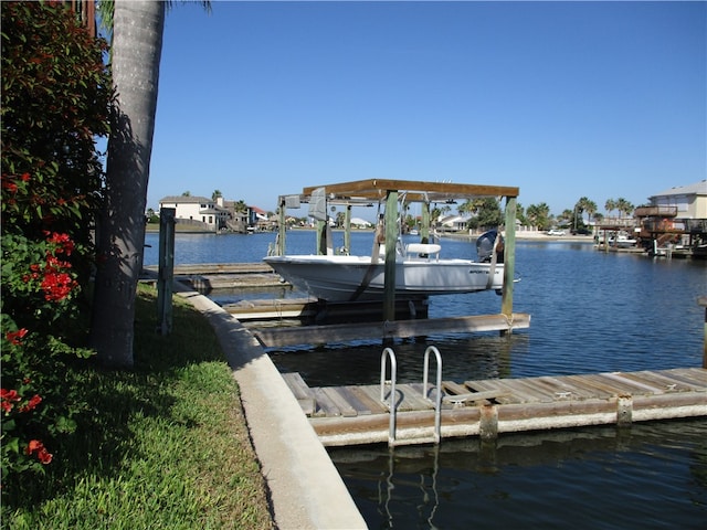 dock area featuring a water view