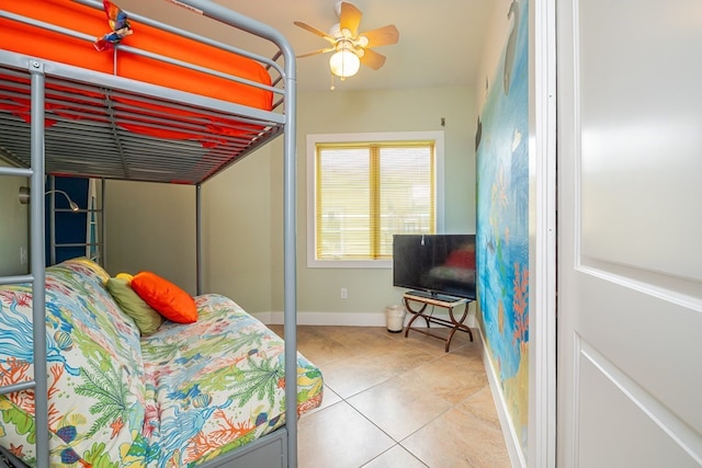 tiled bedroom with ceiling fan