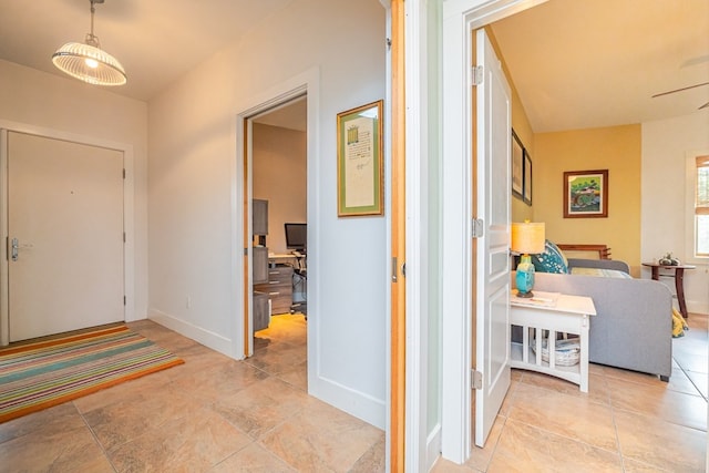 entrance foyer with light tile patterned floors