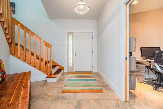 entrance foyer with lofted ceiling