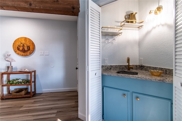 bathroom featuring hardwood / wood-style floors and sink