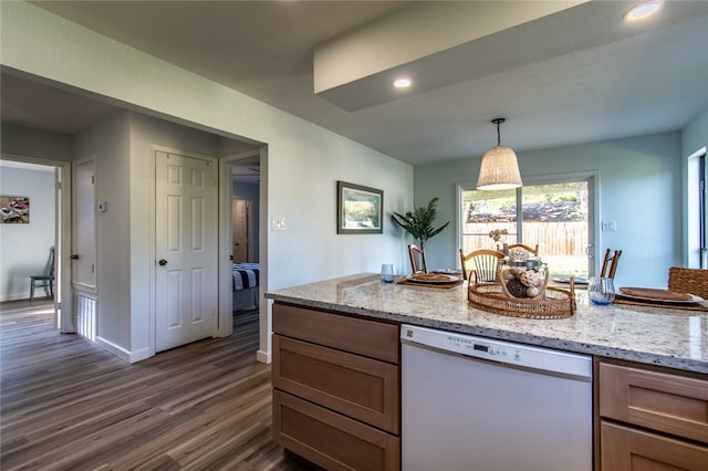 kitchen featuring light stone countertops, dark hardwood / wood-style floors, decorative light fixtures, and dishwasher