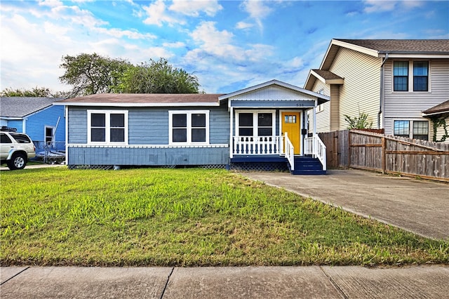 view of front of house with a front lawn