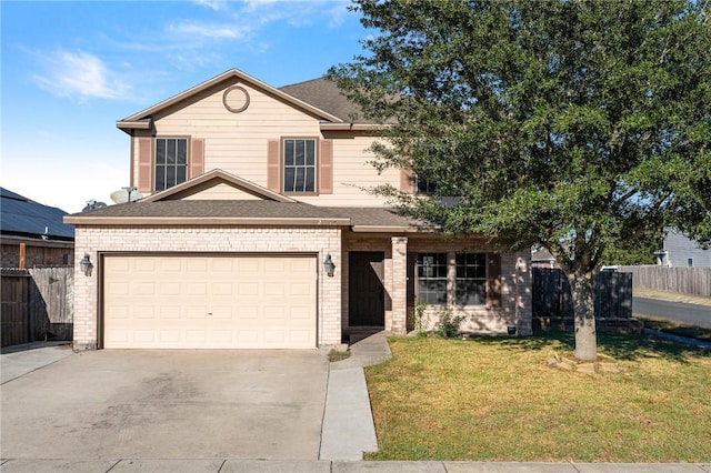 front of property featuring a garage and a front yard