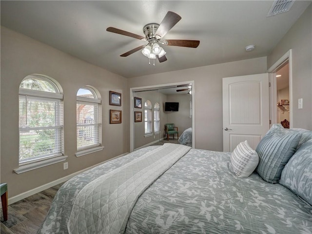 14350 Aquarius St, Corpus Christi, TX 78418 - bedroom featuring baseboards, a ceiling fan, and a closet