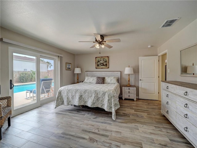 14350 Aquarius St, Corpus Christi, TX 78418 - bedroom with access to exterior, light wood finished floors, and ceiling fan