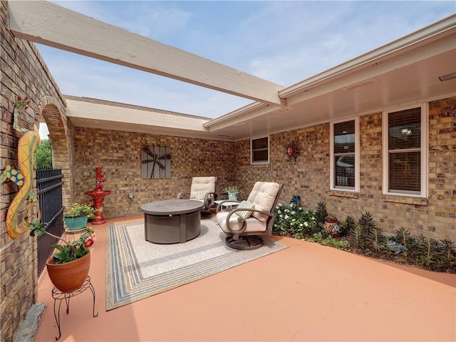 14350 Aquarius St, Corpus Christi, TX 78418 - view of patio / terrace with an outdoor fire pit