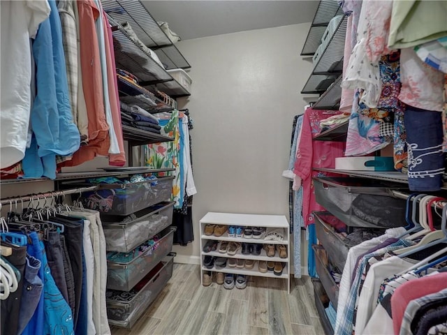 14350 Aquarius St, Corpus Christi, TX 78418 - spacious closet featuring wood finished floors