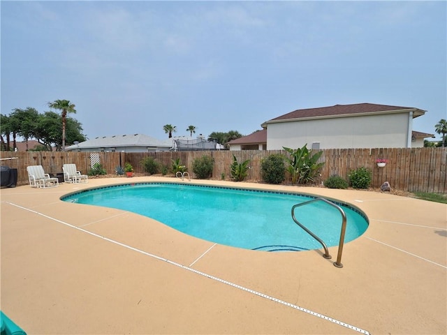 14350 Aquarius St, Corpus Christi, TX 78418 - view of pool featuring a patio and a fenced backyard