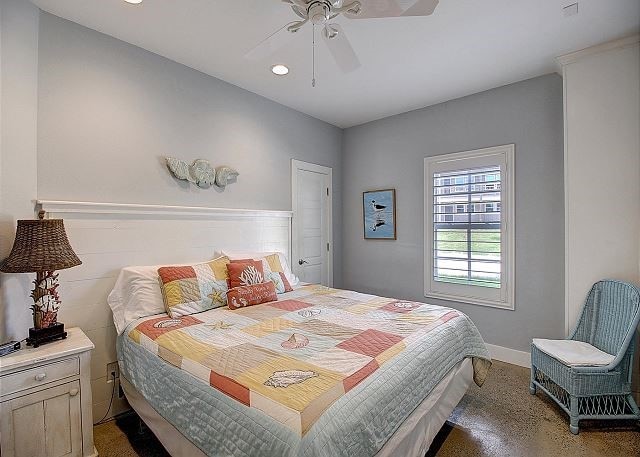 903 Banyan Beach Dr, Port Aransas, TX 78373 - bedroom with ceiling fan and recessed lighting
