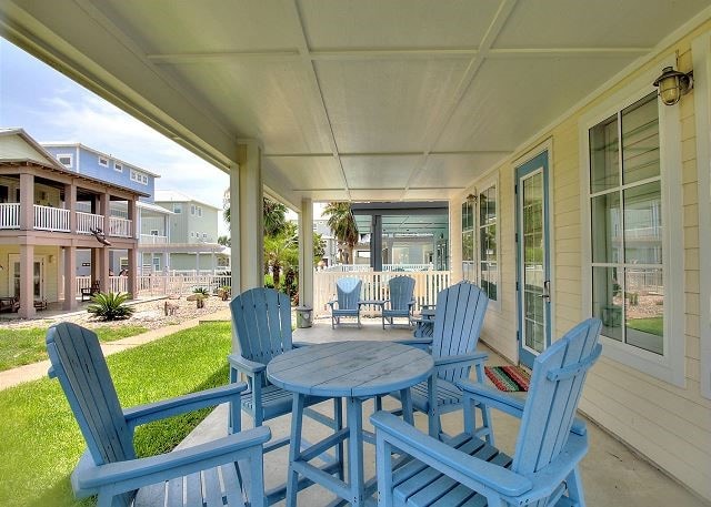 903 Banyan Beach Dr, Port Aransas, TX 78373 - covered porch with a residential view