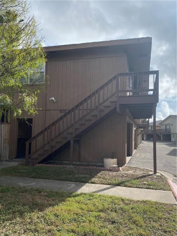 view of side of property with a deck