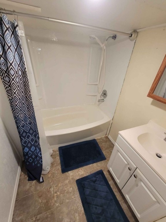 bathroom with vanity and shower / tub combo with curtain