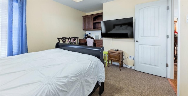 bedroom with light carpet