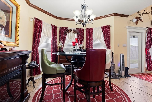 dining area featuring a wealth of natural light, light tile patterned floors, ornamental molding, and a notable chandelier