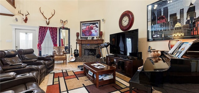 tiled living room with a high end fireplace