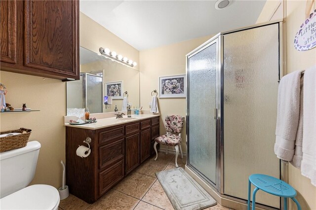 1725 Cliff Maus, Corpus Christi, TX 78416 - bathroom featuring vanity, tile patterned flooring, and a shower stall