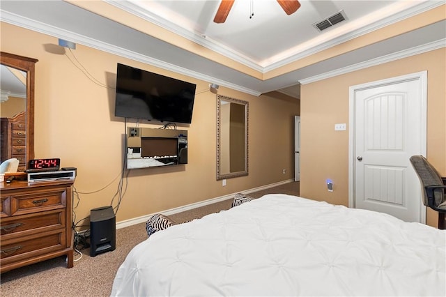 carpeted bedroom with ceiling fan and ornamental molding