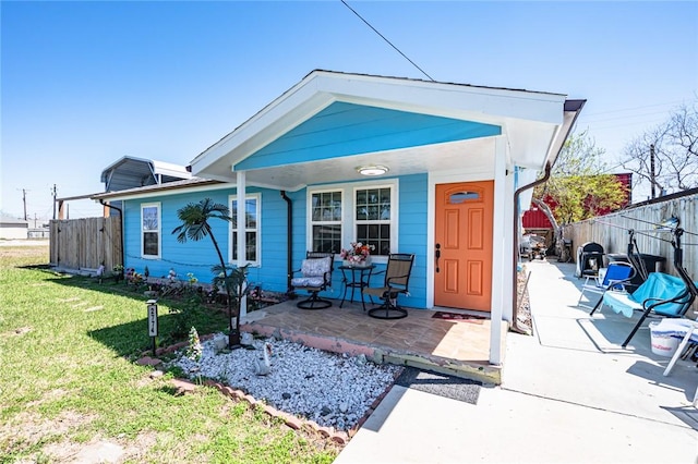 2774 Dallas Ave, Ingleside, TX 78362 - view of front of property with a porch