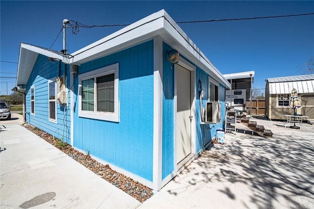 2774 Dallas Ave, Ingleside, TX 78362 - view of side of property with a patio