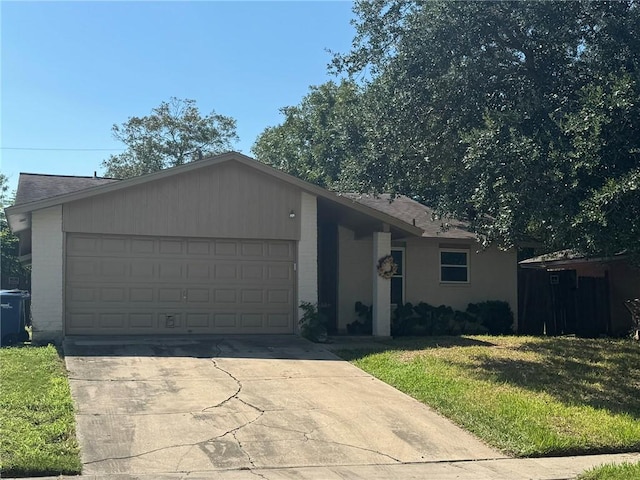 4134 Sierra St, Corpus Christi, TX 78410 - single story home featuring an attached garage, driveway, a front lawn, and a shingled roof