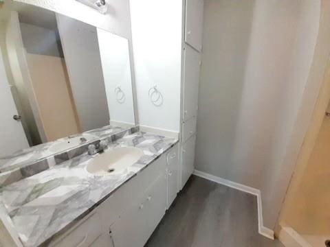 4134 Sierra St, Corpus Christi, TX 78410 - bathroom featuring vanity and wood finished floors