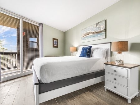 bedroom with wood-type flooring