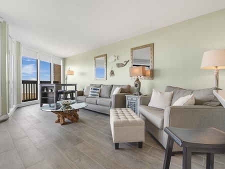 living room with light hardwood / wood-style flooring